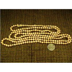 CHOICE on 4: 64" strand of freshwater pearls (2)