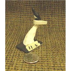 CHOICE on 3 white ivory birds by Thomas Pushruk of King Island: black bird with white chest (2)