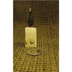 CHOICE on 3 white ivory birds by Thomas Pushruk of King Island: black bird with red feet and white n