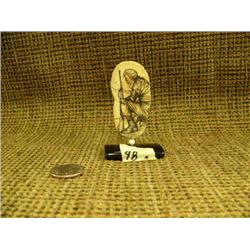 CHOICE on 2: fossilized ivory 2.5" piece scrimshawed by homer Cole of alaska guide with gun (2)