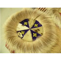 CHOICE on 4: Seal skin wall hangings with bead work 9" (2)