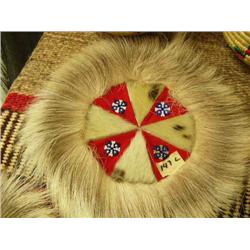 CHOICE on 4: Seal skin wall hangings with bead work 9" (2)