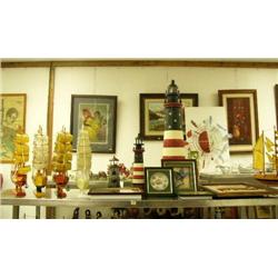 Lot of nautical decorations: Wood ships, lighthouses, framed knives, butterflies, ships and shells, 