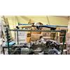 Image 2 : RACK OF ASSORTED AUTOMOTIVE PARTS INCLUDING; MOTORCYCLE WINDSHIELDS & SEATS, CHROME PARTS, RIM CAPS