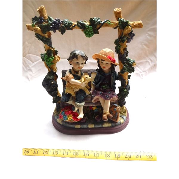 Boy & Girl on Bench Statue