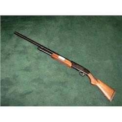 MOSSBERG SHOT GUN