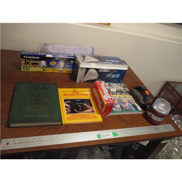 Box of Light Bulbs, Flash Lights, Books, Pillow, Flood Light Bulbs