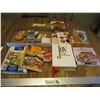 Image 1 : Cookbooks, Uno Game, Cribbage Board, Ribbon, Light Bulb