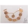 Image 1 : Ladies 22kt gold coin bracelet, soldered with 18kt yellow gold. Includes eight Arabic coins, with pi