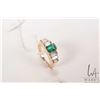 Image 1 : 18kt yellow gold and emerald ring. Set with .83ct emerald cut emerald gemstone and six baguette cut 