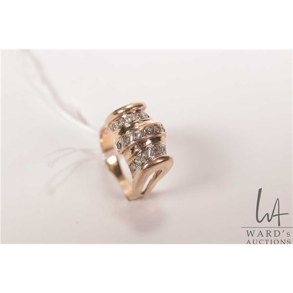 10kt yellow gold and diamond ring, set with .50ct of round full cut natural white diamonds. Retail r