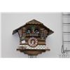 Image 2 : Two cuckoo clocks, including one with dancers, working at time of cataloging, one with traditional b