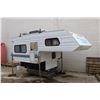 Image 1 : 1999 Slumber Queen 80W Adventurer EXT Camper. 8' base with 6'-9" overhang, overall length of 14'-9".