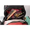 Image 2 : Milwaukee brand welders backpack containing a large selection of hand tools including levels, slag h