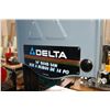 Image 2 : Delta 14" band saw on floor stand with extra blade, working at time of cataloguing. Note: This item 