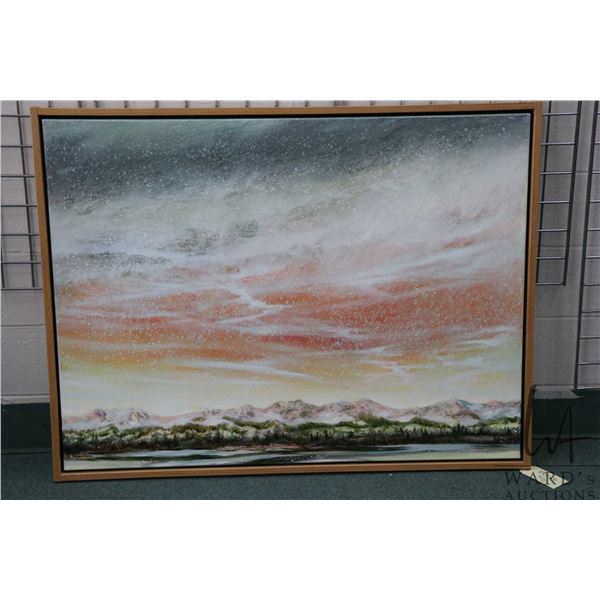 Framed oil on canvas painting of a snowy sky mountainscape, signed by artist Richard Dixon, 38" X 50