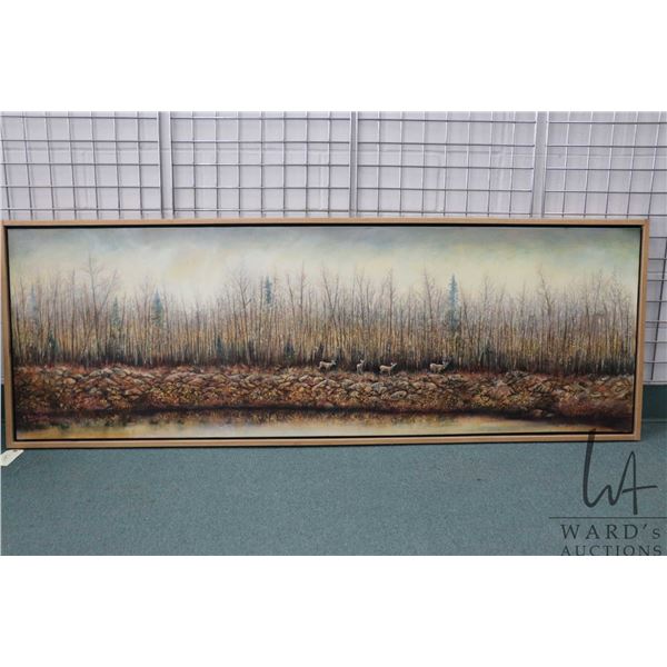 Framed oil on canvas painting of an autumnal forest scene with migrating deer, signed by artist Rich