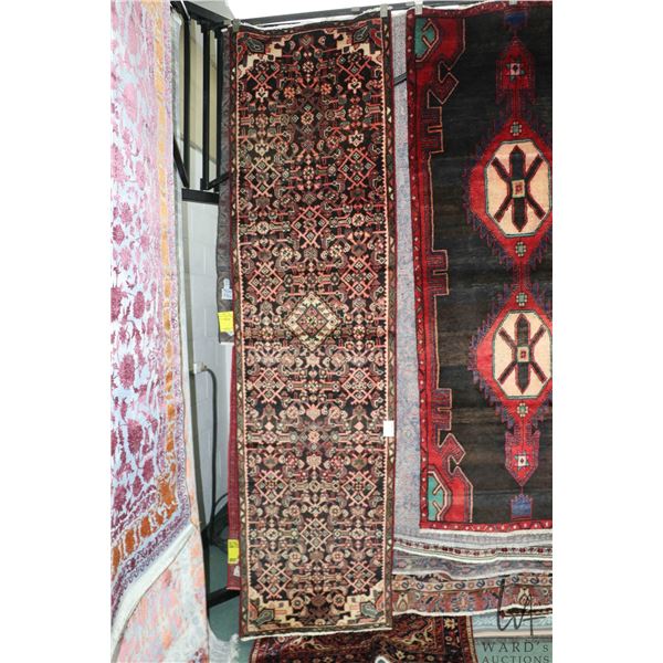 100% handmade Iranian wool carpet runner "Hamdan" with overall geometric design, black background an