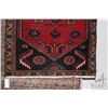 Image 2 : 100% handmade Iranian wool carpet "Zanjan" with center medallion, red background and highlights of b