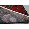 Image 3 : 100% handmade Iranian wool carpet "Zanjan" with center medallion, red background and highlights of b