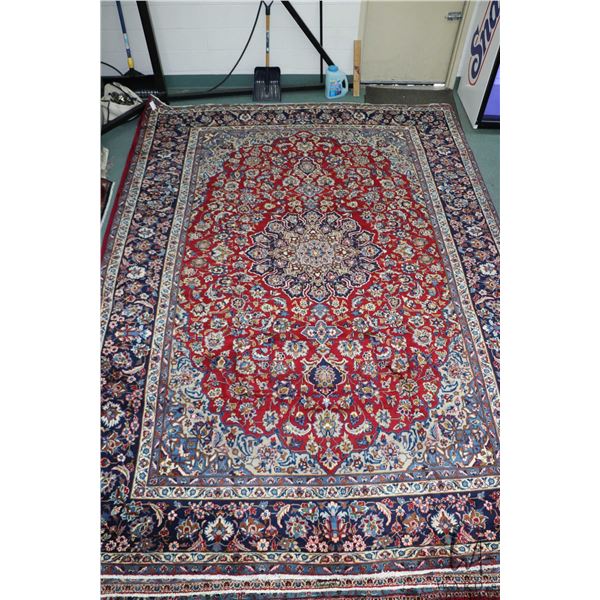 100% handmade Iranian wool carpet " Esfahan" with center medallion, red background and floral design