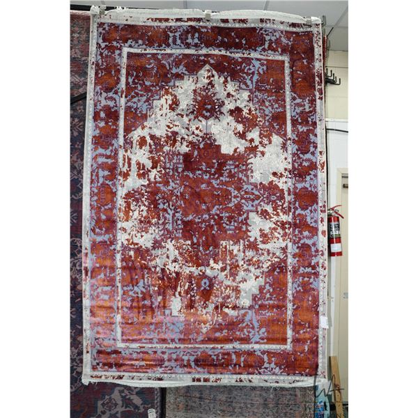 New Premium Collection Sizan blended carpet with mottled pink pattern with gray and cream low lights