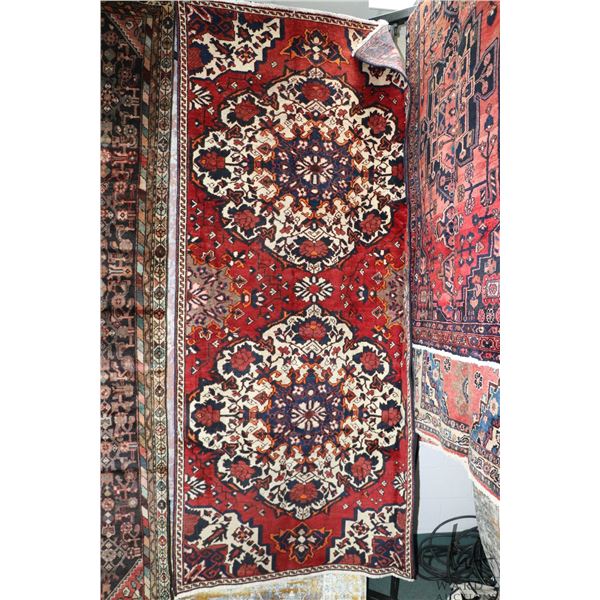 100% handmade Iranian wool carpet "Bakhtyar" with double medallion, red background and floral design