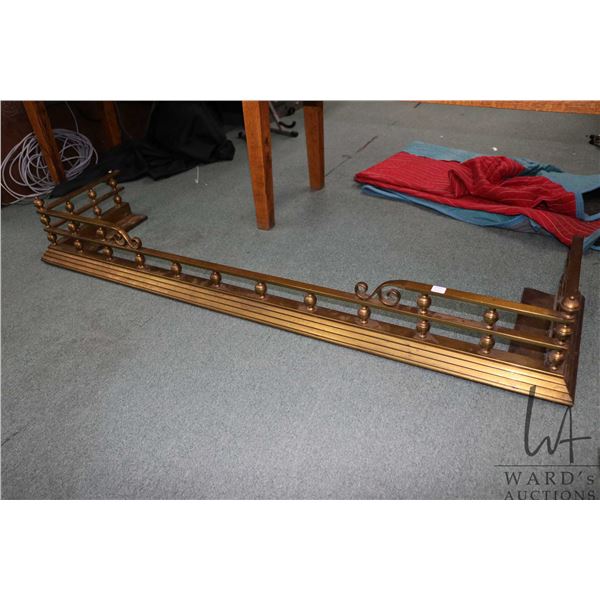 Antique brass fireplace fender, outside dimensions 9" H X 59" W X 14" D