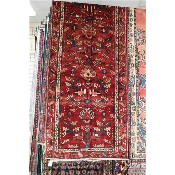 100% handmade Iranian wool carpet runner, "Zanjan" with red background, overall geometric pattern an