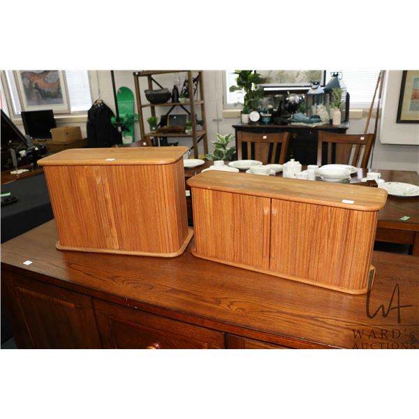 Two Mid century throw back, teak side rolling table top storage cabinets, 9" H X 21" W X 7" D and 12