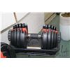 Image 2 : Pair of Bowflex brand dial weight with stand. . Note: This item is not available for shipping. Local