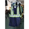 Image 2 : Selection of work wear including a pair of coveralls, size unknown, size XL rain coat and size large