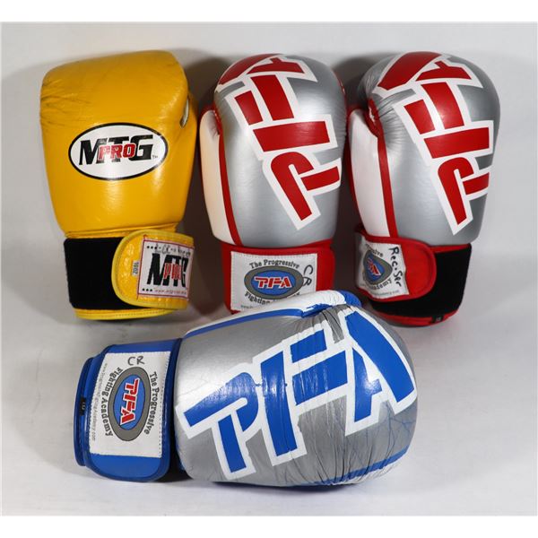 THREE RIGHT HAND AND ONE LEFT HAND BOXING GLOVES