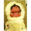Image 2 : Lot of: wood mask with fur trim, fur slippers and doll with fur parka and pants (159)