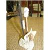 Image 6 : 6 1/4 inch tall Ivory, fossilized ivory and bone sculpture with 3 ivory faces, kayak, and baleen on 