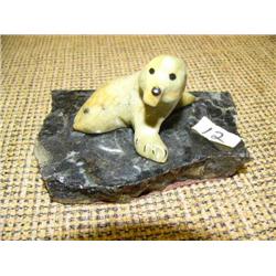 Soapstone seal on rock base 5" long and 2 3/4 high (2)
