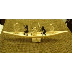 14 1/2" boat with 5 African figures (2)