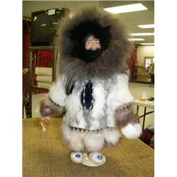 16" Eskimo Doll with wood face and wood ulu with very detailed fur parka with incredible detailed be