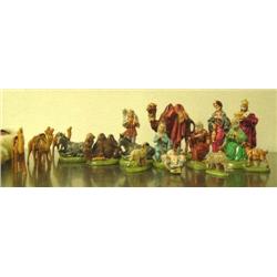 Lot of: 4 wood camels and 14 piece Nativity Set (159)
