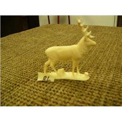 2 3/4" tall ivory elk carving (2)