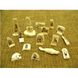 Lot of 16 ivory pieces with scrimshawed faces, Eskimo, seals, etc. (159)