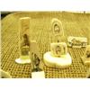 Image 2 : Lot of 16 ivory pieces with scrimshawed faces, Eskimo, seals, etc. (159)