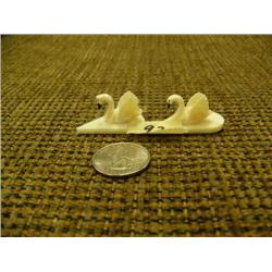 Lot of 2 Ivory swans: stock # 537F and 537F, retail value $75.00 (2)