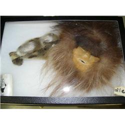 CHOICE on 3: seal made of fur, piece of ivory with scrimshaw of seal man, skin mask with fur trim (7