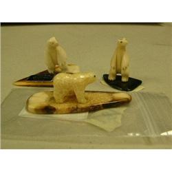 Lot of 3 ivory and fossilized ivory bears and jade and ivory bases (2)