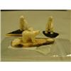 Image 1 : Lot of 3 ivory and fossilized ivory bears and jade and ivory bases (2)