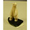 Image 3 : Lot of 3 ivory and fossilized ivory bears and jade and ivory bases (2)