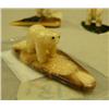 Image 4 : Lot of 3 ivory and fossilized ivory bears and jade and ivory bases (2)