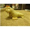 Image 1 : 8" long soapstone walrus with ivory tusks by E.T. III (2)