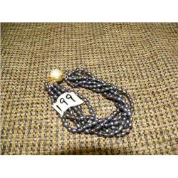 Hematite multi-strand bracelet with faux pearl clasp (2)